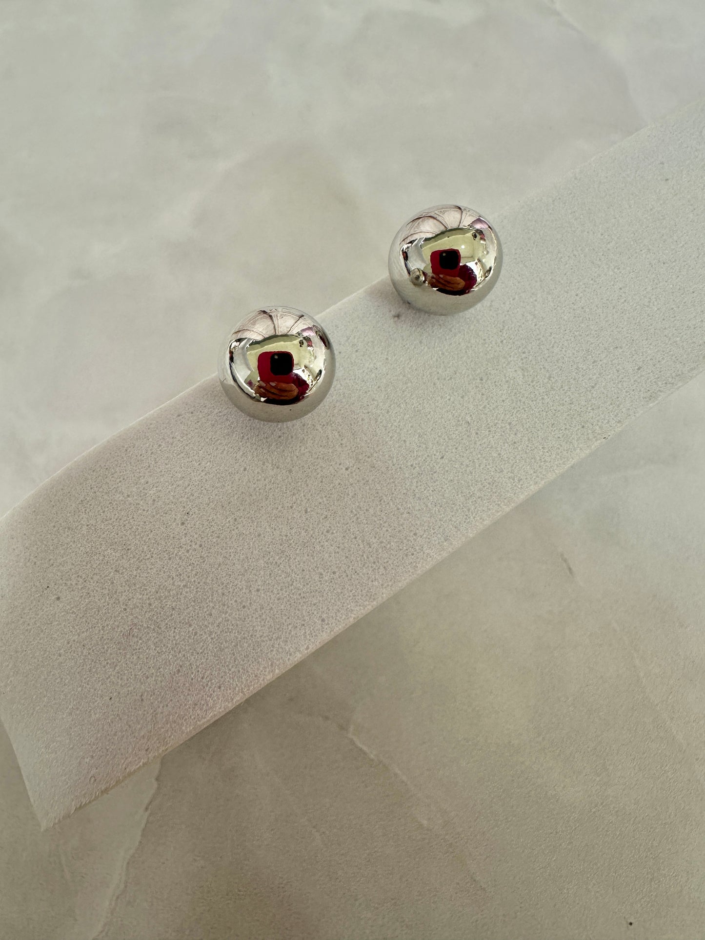 Pendientes plateados variados