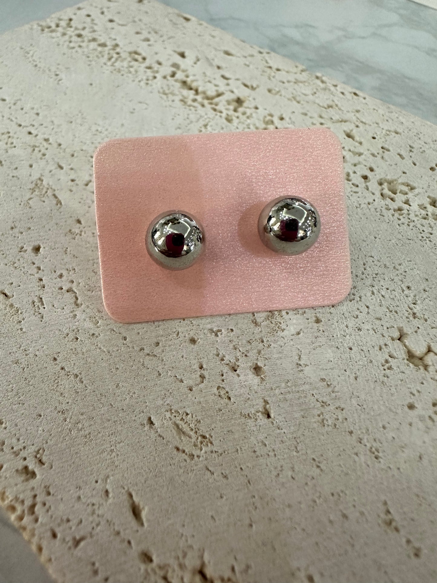 Pendientes plateados variados