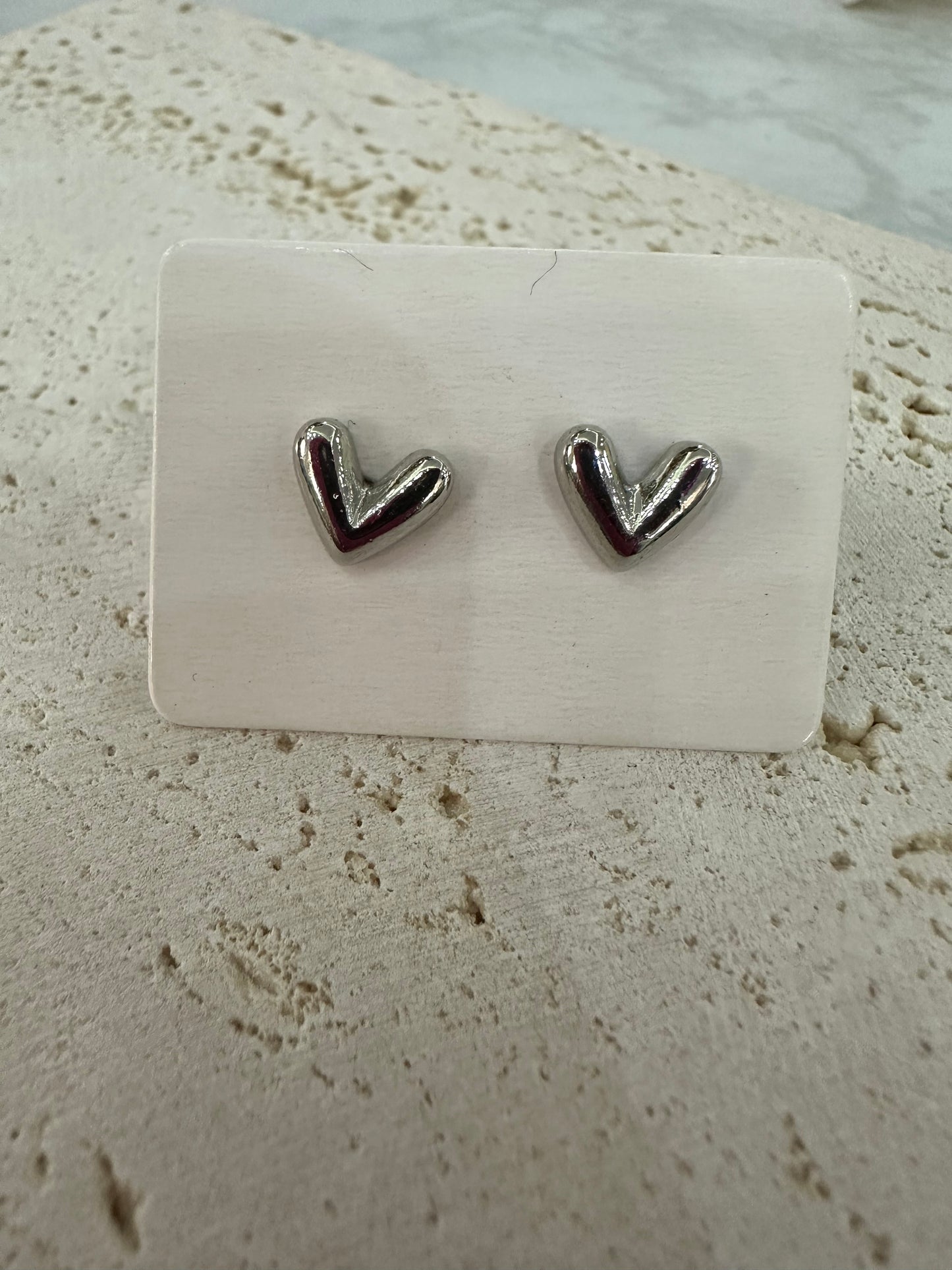 Pendientes plateados variados