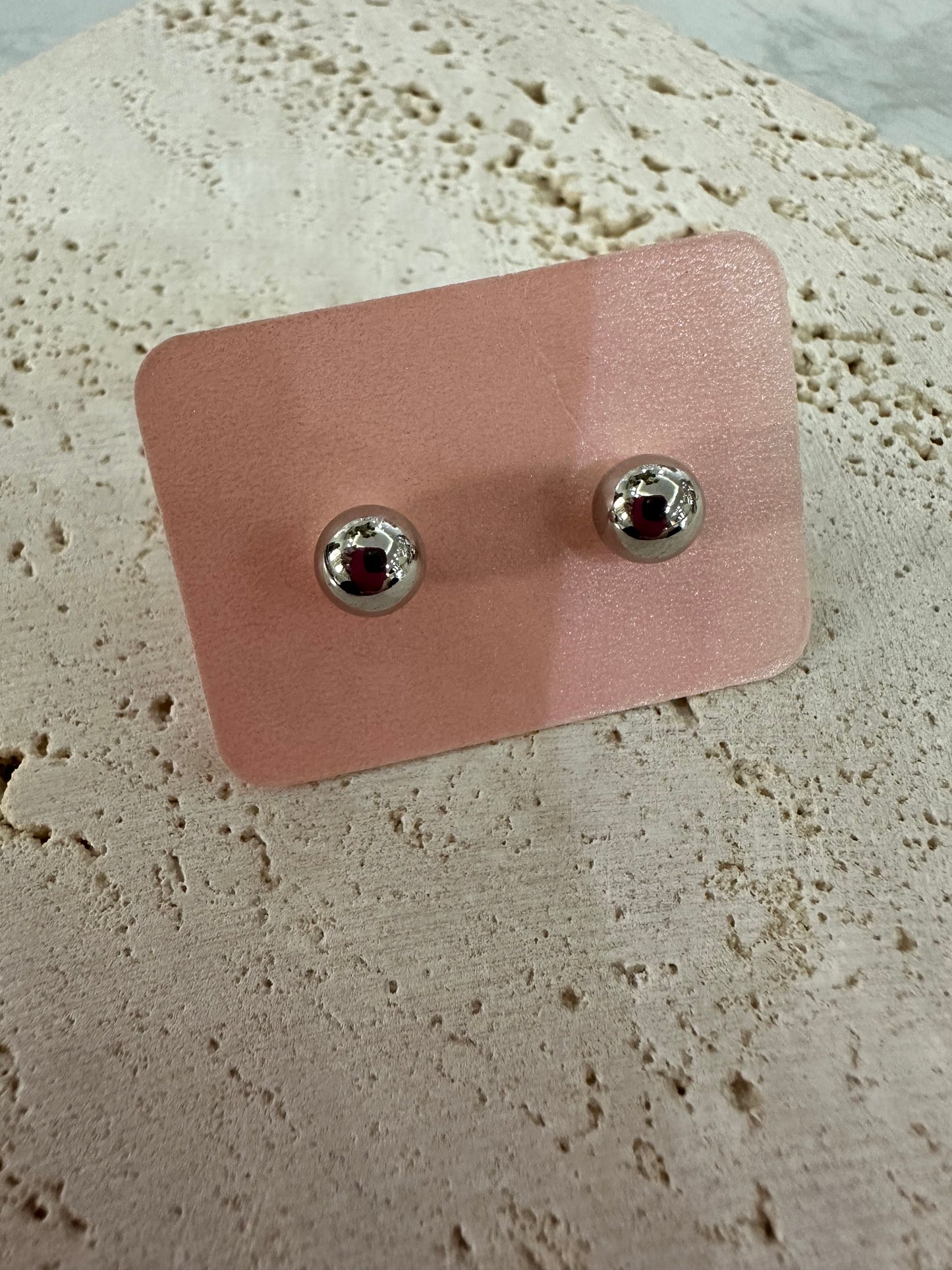 Pendientes plateados variados