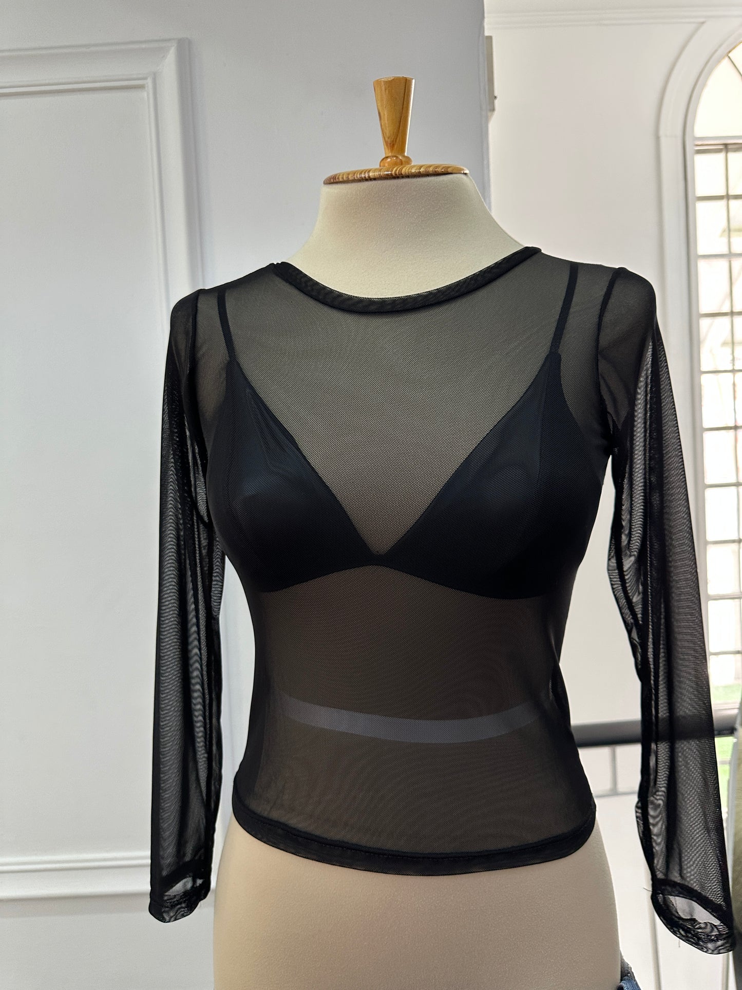 Blusa transparente negra